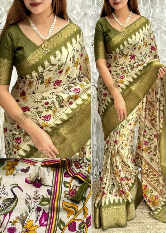 Woman wearing a floral saree with green border, close-up details shown.