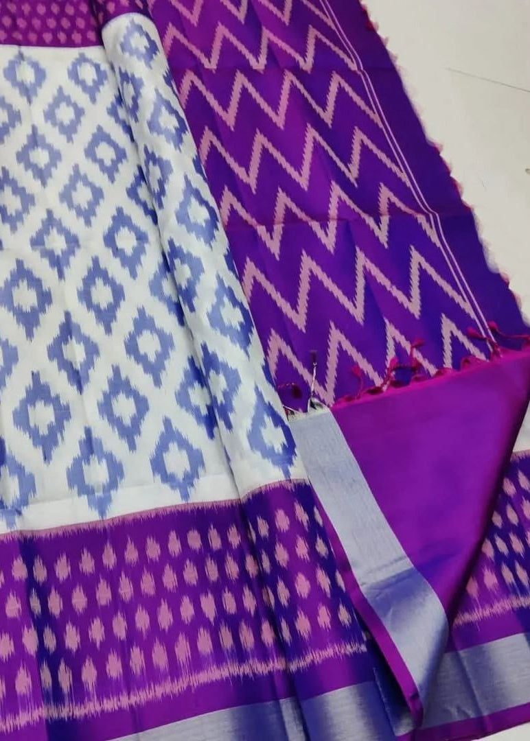 Purple and white patterned fabric on a white background
