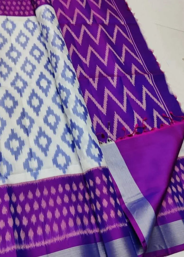 Purple and white patterned fabric on a white background