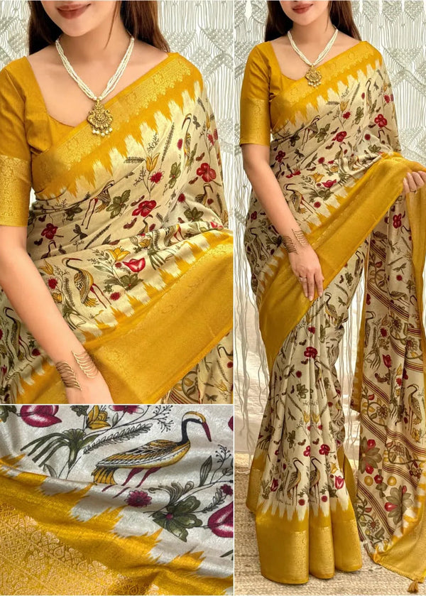 Woman wearing a yellow and beige saree with floral patterns, close-up of fabric, and detailed design.