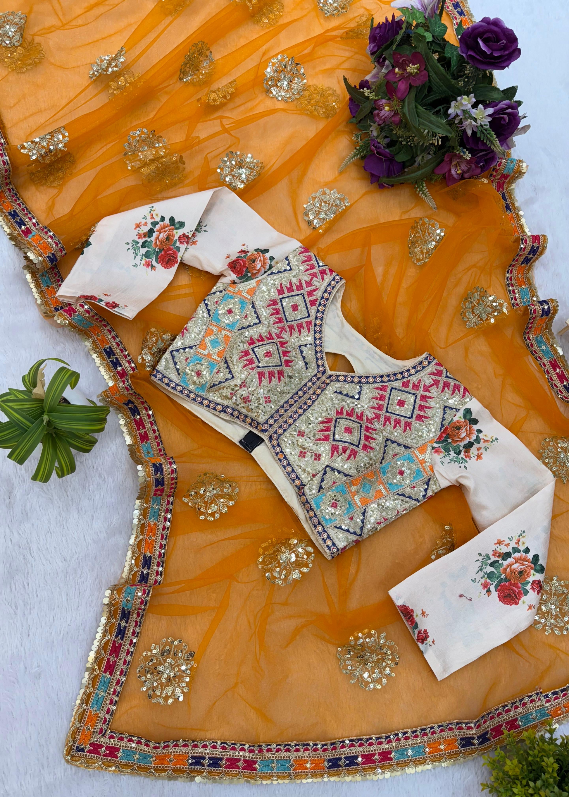 Traditional embroidered outfit with a yellow fabric and floral accessories on a white background
