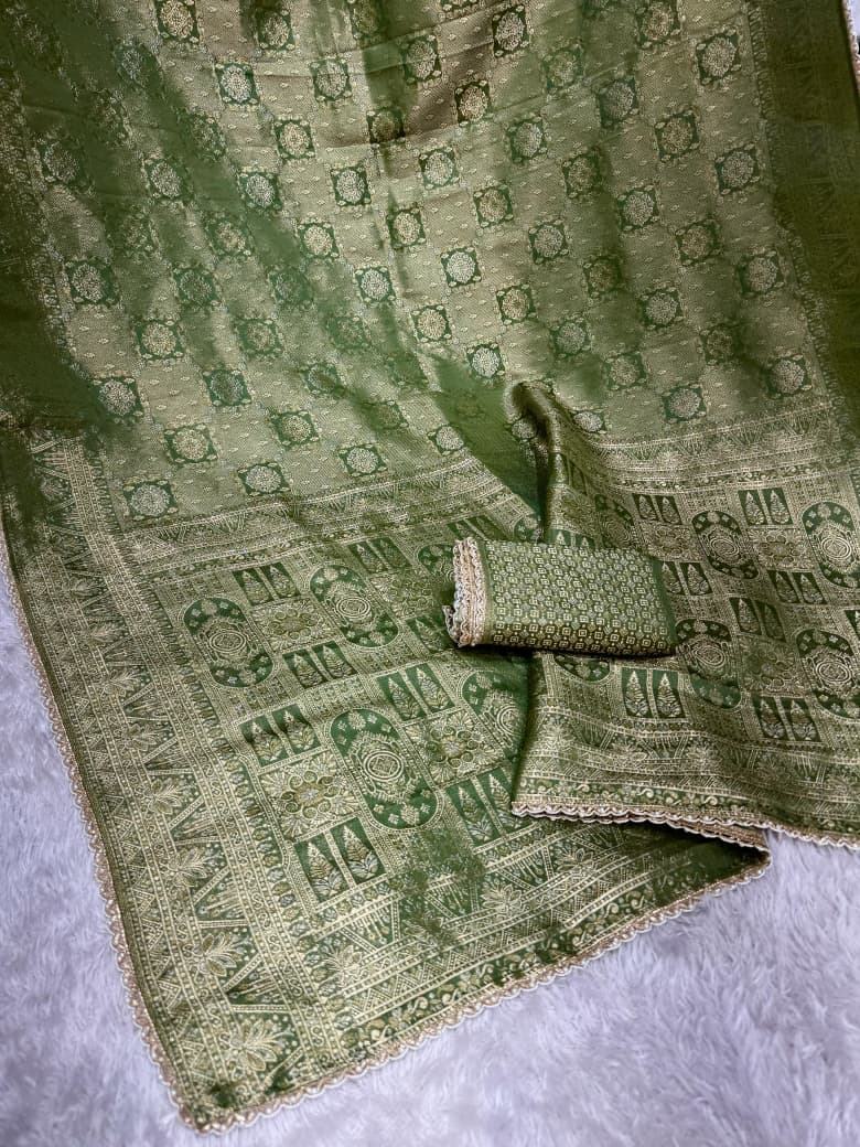 Swara green jacquard saree showing zari woven pallu and running blouse