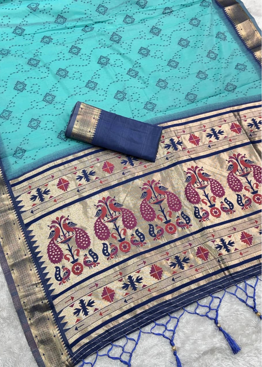 Traditional saree with a blue and gold border on a light blue background