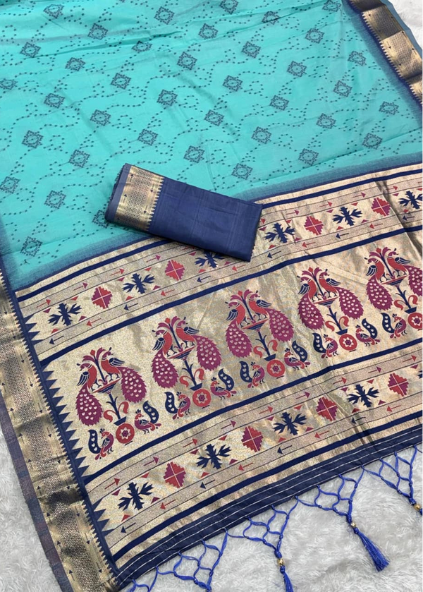 Traditional saree with a blue and gold border on a light blue background