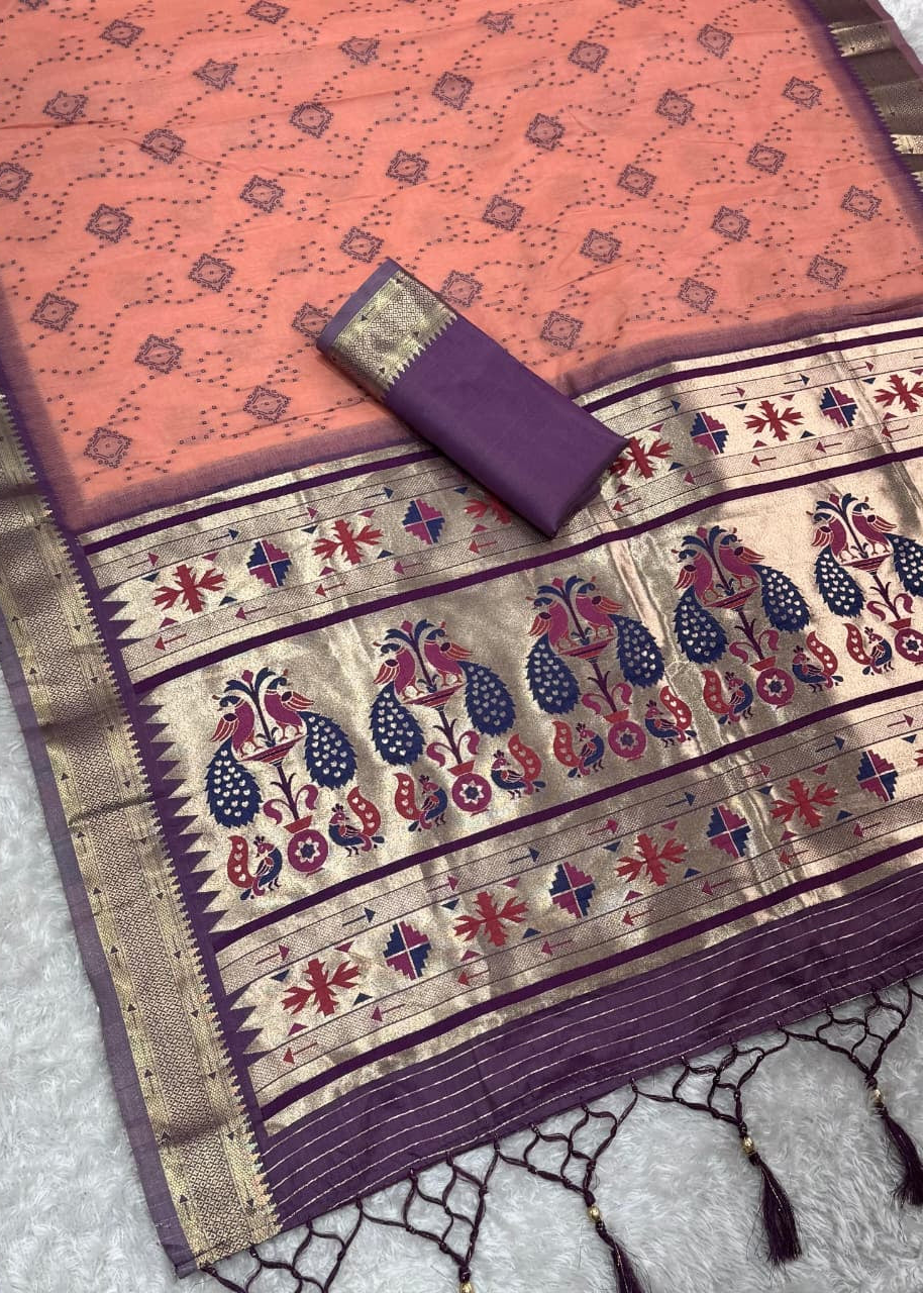 Traditional saree with intricate patterns on a textured surface