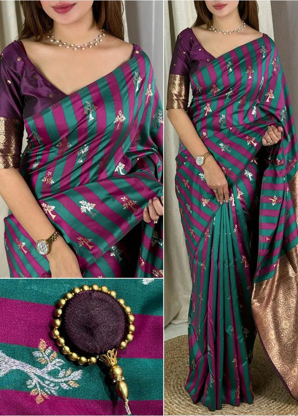 Woman wearing a purple and green saree with gold accents, close-up of saree details.