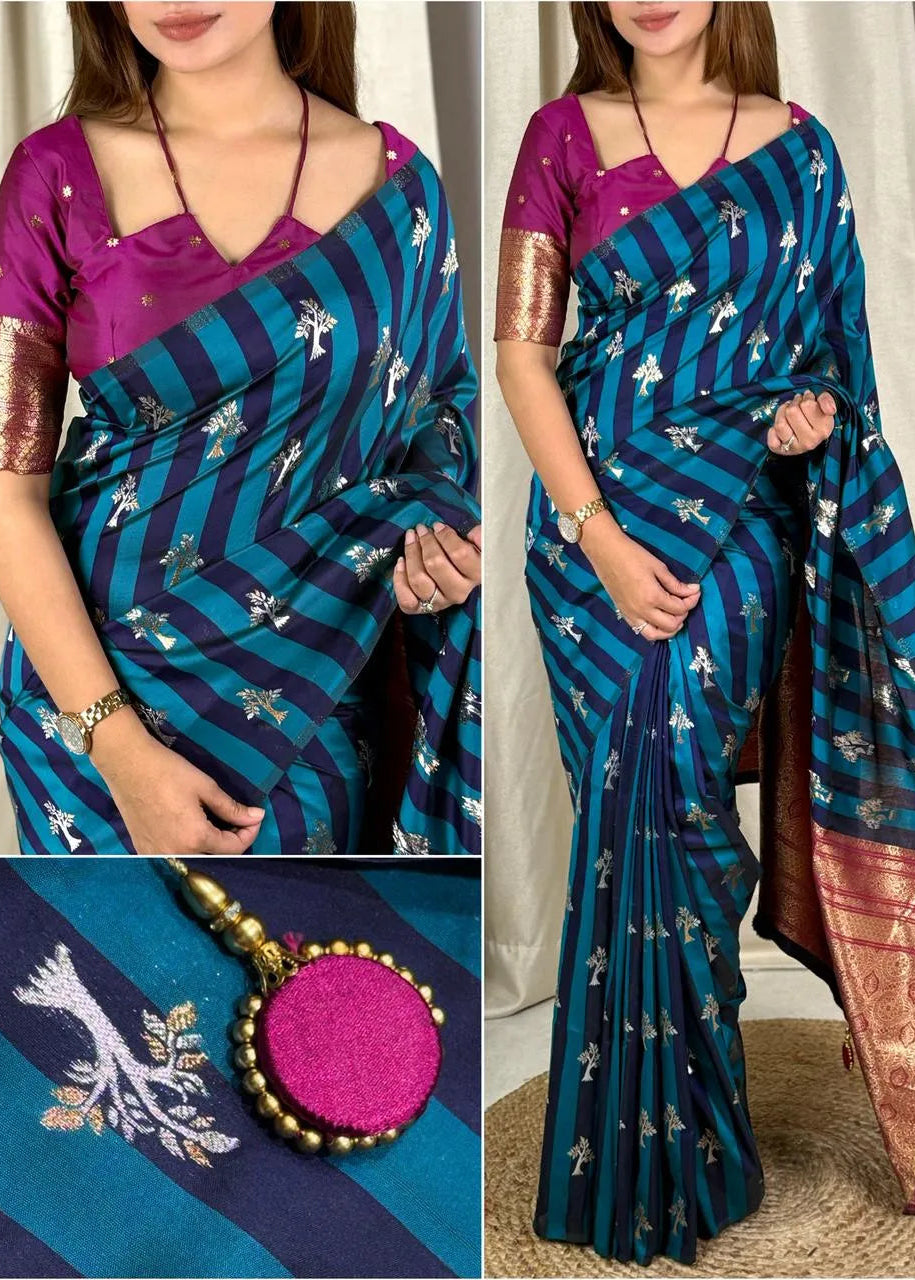 Woman wearing a blue and purple saree with a close-up of the fabric and a pendant.