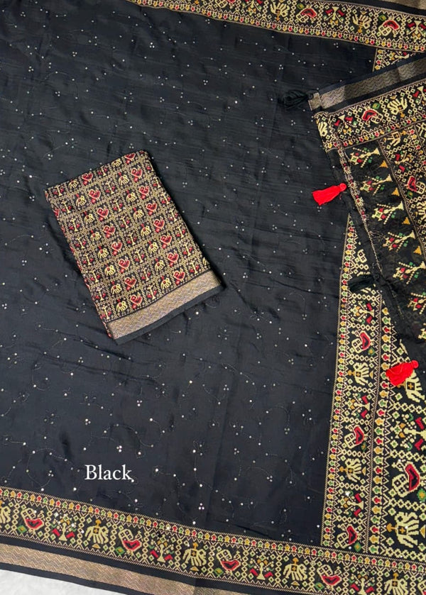 Black saree with colorful border and patterns