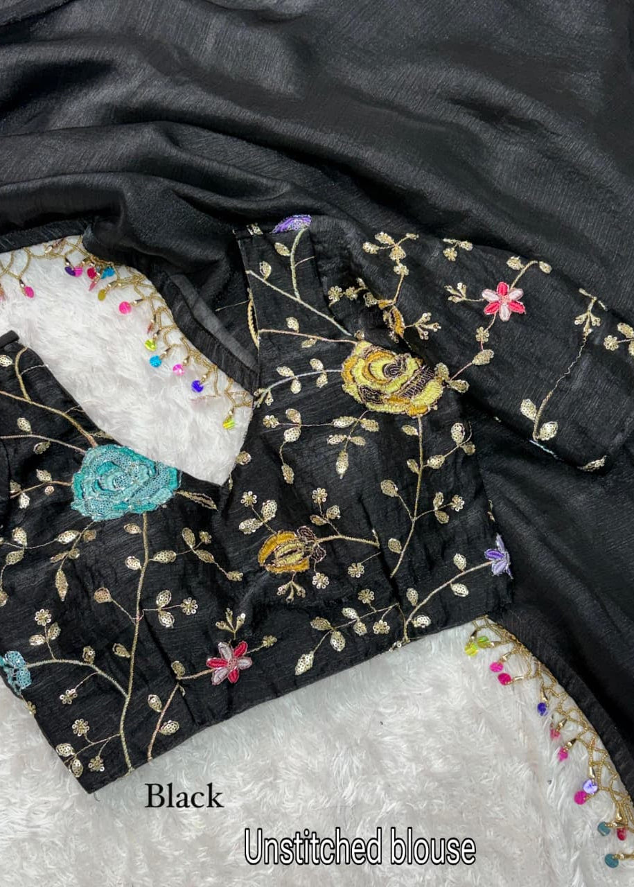 Black unstitched blouse with floral and bird embroidery on a white background