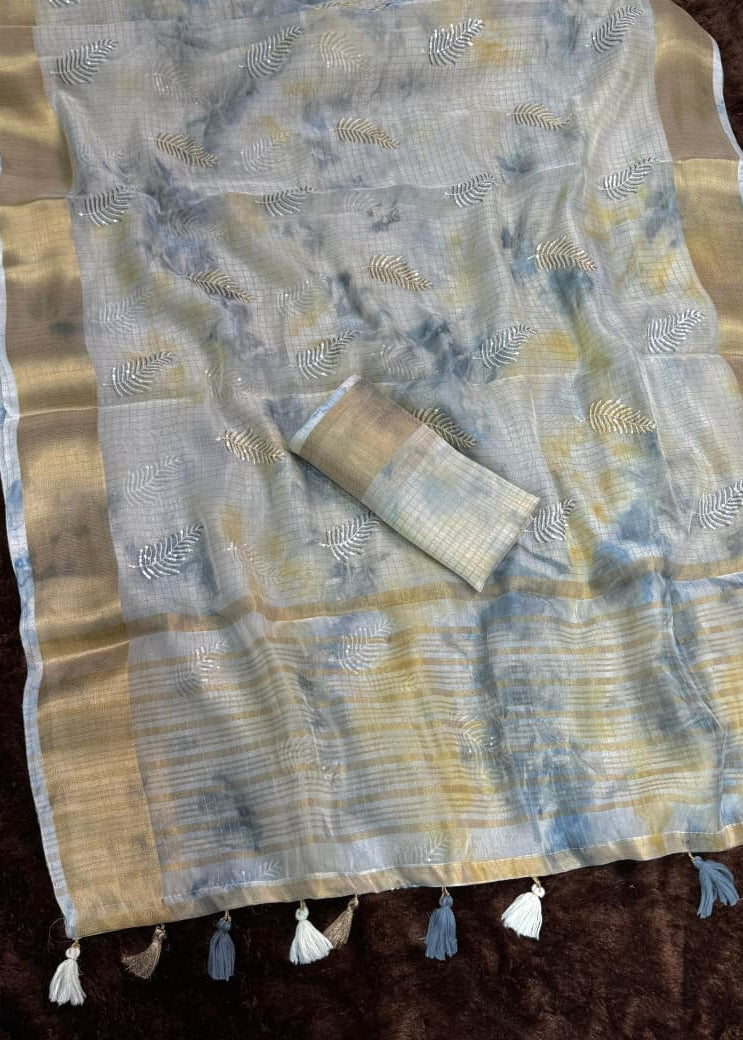 Saree with a pattern on a brown background