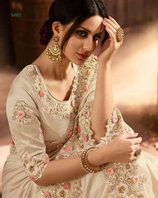 Vasundhara Heritage Tissue Beige Silk Saree – Handcrafted Embellished Royal Collection