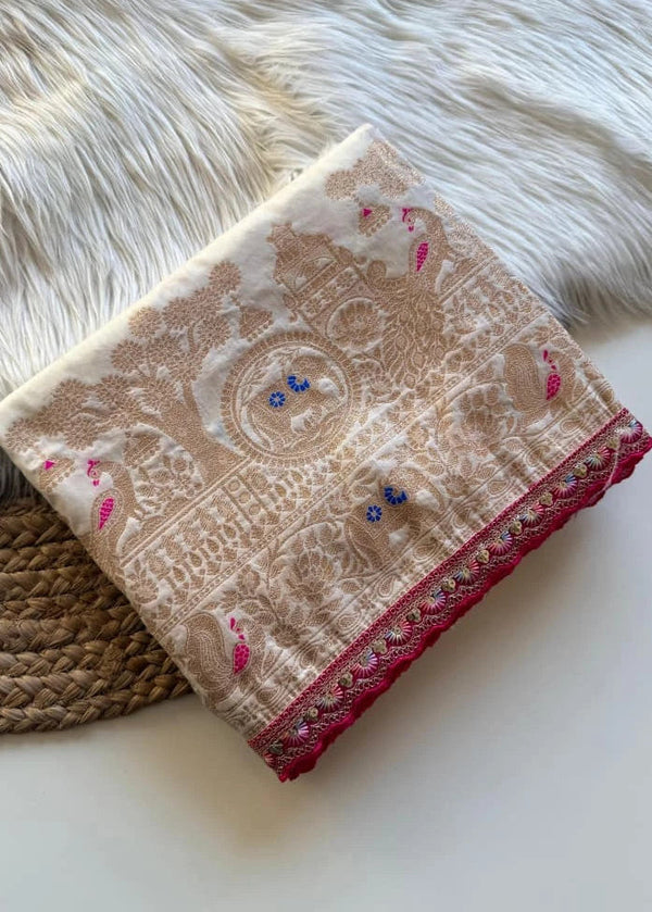 Embroidered fabric with intricate patterns on a textured surface