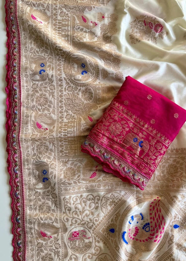 Embroidered fabric with a pink folded fabric on top