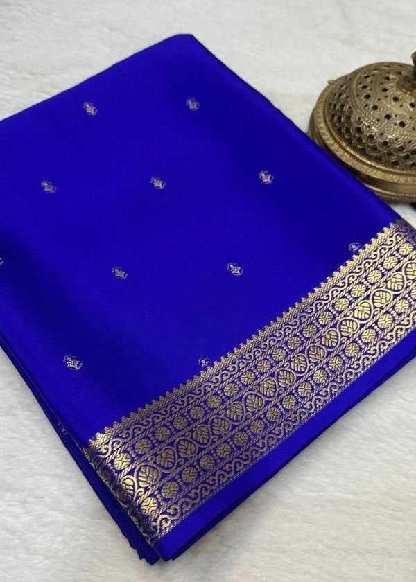 Blue saree with gold border on a white background