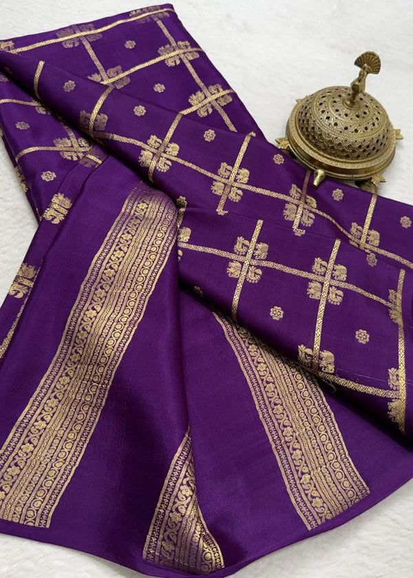 Purple saree with gold patterns on a white background
