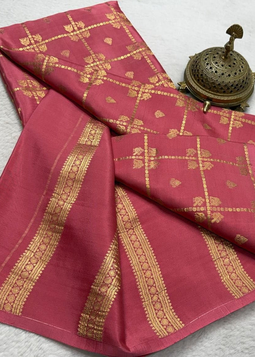 Red fabric with gold patterns on a white background