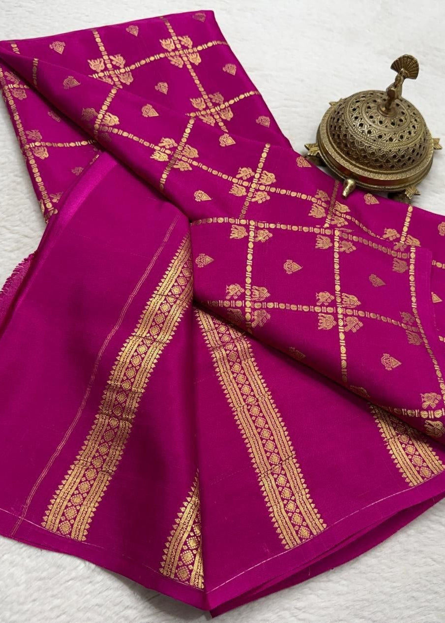 Purple fabric with gold patterns on a white background