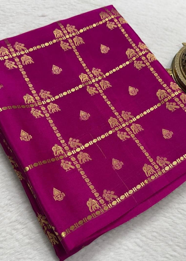 Purple fabric with gold patterns on a white background