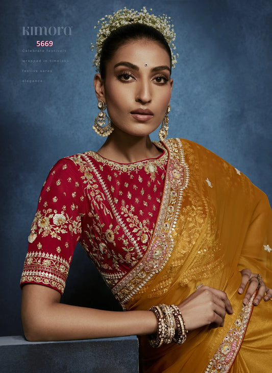 Saffron Opulence Fancy Tissue Saree with Snowflake Butti & Zardozi Border — Ready Blouse